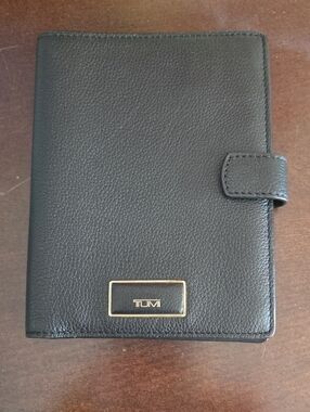 Tumi Black Leather Snap Wallet with Gold Logo Plate